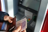 State pensioners rush to withdraw cash over 'draconian' new HMRC rule