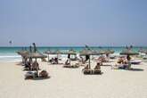 UK tourists in Spain who use parasols at beaches or pools 'warned'