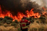 Horror 'fire tornado' tears through European tourist hotspot as death toll rises