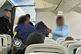 Armed police arrest seven for causing chaos on TUI flight