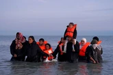 Two migrants sent to France as Government wins late-night High Court battle