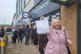 Large queues at new Birmingham chip shop as customers flood in holding one thing in their hands