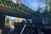 Birmingham railway bridge struck again as lorry toppled and trains halted