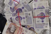 Chilling new police photos show 'deal-ready bags' and wads of cash taken off the streets