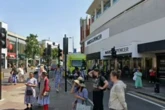 Car 'ploughs into pedestrians' outside busy UK M&S with three injured