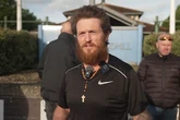 Tommy Robinson debuts new look as he is released from prison early