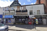 End of eyesore club promised as new flats and cafe plan approved