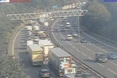 M6 huge delays live as drivers stuck in gridlock traffic near Birmingham after oil spillage