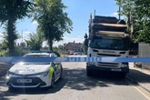 Man hit by bin lorry as driver speaks to police at scene
