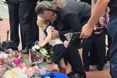 Tear-jerking moment Ozzy Osbourne's grandson visits Broad Street shrine during procession