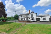 Police cordon off Bartley Green verge as man injured in mystery 'violence' outside pub
