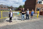 Neighbours 'blocked from homes' after shopkeeper installs barrier