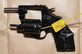 Five jailed for 30 years over gun-running plot run from jail cell