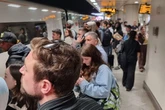 Crowds at Birmingham New Street as trains north and south cancelled and delayed