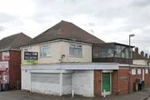 Council rejects move to build flats above shop