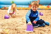 Free manmade beach opening near Birmingham with deckchairs for parents