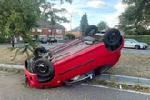 Kings Road crash live as car left on roof after police chase