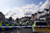 Aston Lane blocked live as police respond to 'man on roof' and homes evacuated