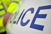 Man arrested after woman found injured inside Lichfield home