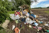 ‘Scumbags’ twice fly-tip mound of household waste on Sutton Coldfield field