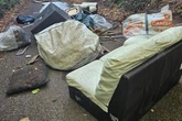 Police close Birmingham road after fly-tippers block short cut route
