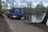 Stolen scaffolding truck driven through fence and dumped near pond