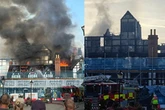 Two girls, 13 and 14, arrested on suspicion of arson after Raven Hotel destroyed in fire