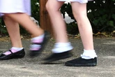 Girl, 8, who overcame open heart surgery dies after falling ill at school