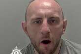 First picture of yawning robber arrested at Birmingham Airport before he could jet off on holiday