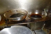Inside 'dirty' takeaway where mice left poo and there was no running hot water