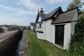Stunning Grade-II listed canalside toll house on market for just £14k