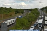 Rush hour delays live as vehicle burst into flames on the M42