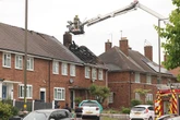 In pictures: Roof destroyed in large house fire in Garretts Green