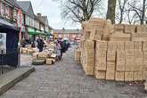 Cardboard box mountain on Birmingham street - as trader says 'cheapest in England'