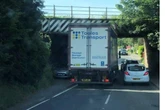 Moment lorry becomes trapped under bridge in Bromsgrove