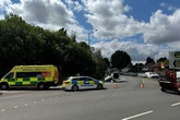 Three people injured after car overturns on busy Midlands road