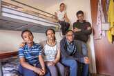 Mum with four kids squashed in Birmingham hostel says 'please help'