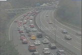 M6 delays at Spaghetti Junction after four cars crash and fuel spillage