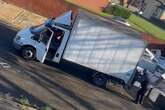 Moment brazen fly-tippers dump van load of fridges on residential street in broad daylight