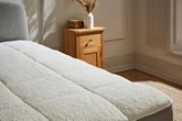 Dunelm's new £18 'snug as a bug' teddy mattress topper shoppers say is 'like sleeping on a cloud'