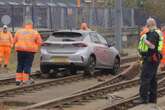 Crews remove dumped Corsa from city Metro tracks as police hunt abandoned car driver