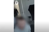 Moment police break down door as three men arrested in dramatic raid