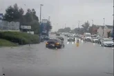 Watch as car stranded by floodwater outside Tesco as heavy rain batters Black Country