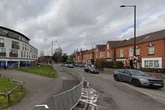Armed police in Erdington arrest 'suspicious' man as road blocked off