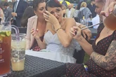Jilted bride ridiculed as 'pathetic' for wearing white gown at racecourse