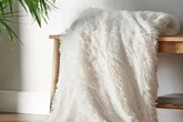 Dunelm £19 throw in seven colours is like a 'great warming hug'