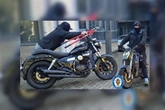 Moment 'brazen thief wheels away stolen motorbike' with bolt cutters in hand