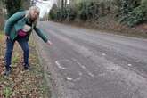 Midland road with faded 'slow' marking labelled 'accident waiting to happen'