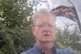 Councillor calls for 'intimidatory' St George's flags to be taken down