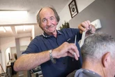 End of an era as Birmingham barber hangs up his scissors after half a century